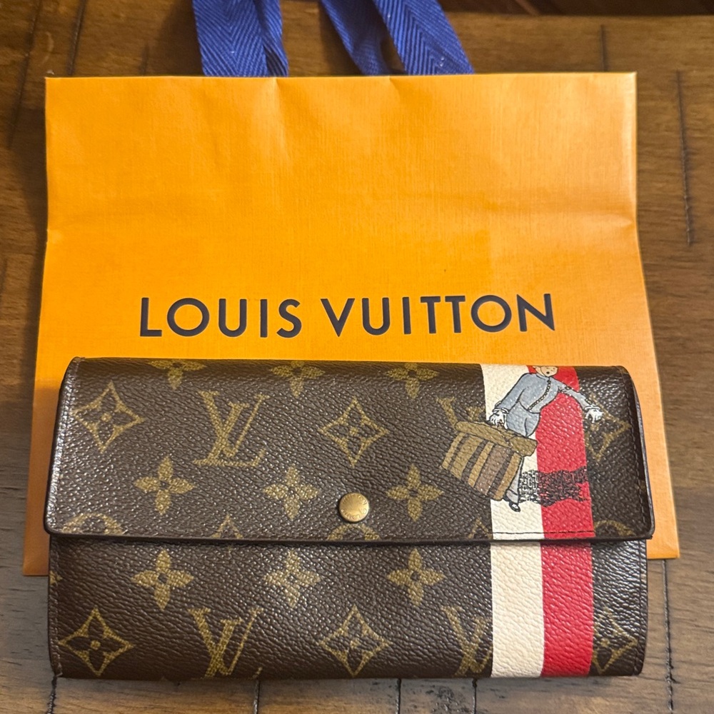Authentic- Louis Vuitton Bellboy Groom Sarah monogram wallet limited edition (C)